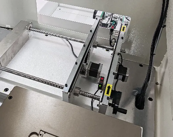 Rail-mounted Discharge Structure